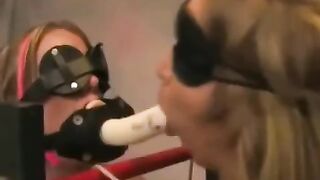 Two lesbians are having fun with each other using sex toys