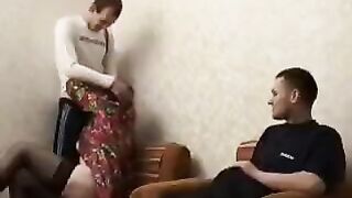 Mature woman fucked by her son's friend in the hotel room