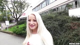A sexy blonde with natural tits in a private scene