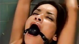 Sex machine action with a bald guy and his bound girlfriend