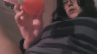 A solo performance with a high-powered vibrator for intense stimulation