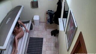 A hidden camera caught naked client in the solarium