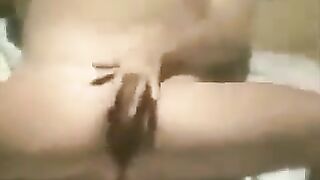 The girl masturbates on the beach with a hidden camera