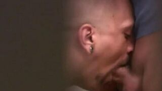 Public toilet scene with two guys jerking each other off