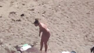 A couple enjoys intimate moments at sea without clothes