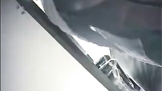 The hidden camera at the checkout captures a skirted chick