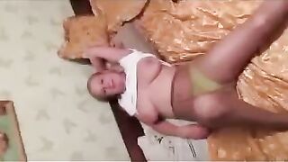 The pregnant woman has thrown her boobs to the photographer
