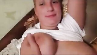 The pregnant woman has thrown her boobs to the photographer