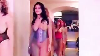 A big-breasted beauty is getting fucked by a group of men