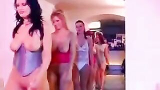 A big-breasted beauty is getting fucked by a group of men