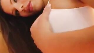 Girl plays with a dildo and gets her pussy wet close-up