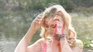 Hot blonde girl masturbating on the lake