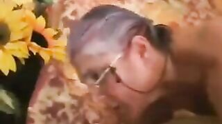 A man fucked a gray-haired woman in black stockings