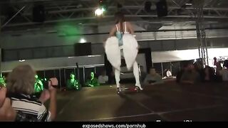 A lesson in striptease on a pole for a hot brunette