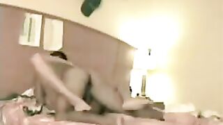 A blonde has sex while spreading her legs to show her holes