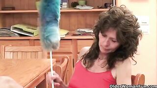 A mature woman plays with her pussy with passion