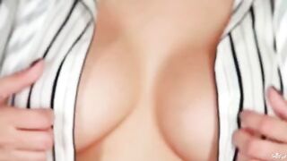A girl with natural big breasts shows her beautiful body