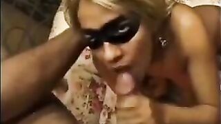 A woman has sex with another man in front of her husband