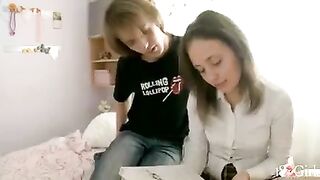 A girl is having fun with her classmate at home after their lessons
