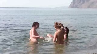 Nude beauty has sex directly on the beach