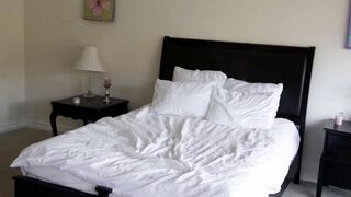 Two cute blondes have gentle sex on the bed, showcasing their delicate passion