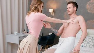 A couple has a conversation while lying on the bed completely naked
