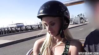 A beautiful blonde is having a wild day, and she needs to cool down