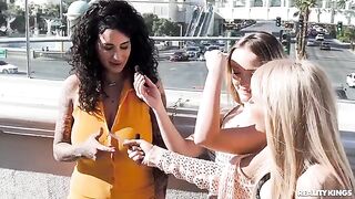 Girls have a sexy lesbian threesome on the strip
