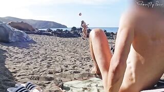 Two girls almost got caught while flashing on a nude beach