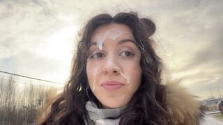 A man walked on the city streets with a semen on his face