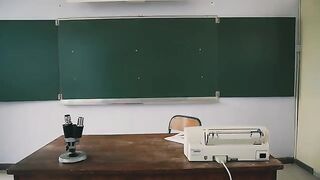 The girl is having fun with her teacher in class