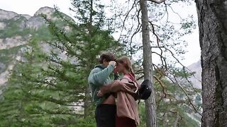 A couple making love in the forest, outdoor passionate session