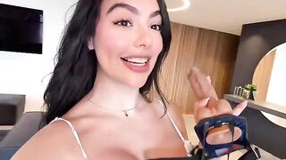 With the strap-on in her hands—they’re both in heaven, enjoying the best