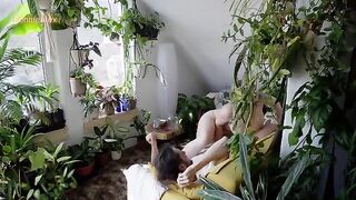 The couple enjoys passionate intimacy on a cozy afternoon